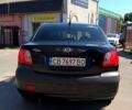 Чорний Кіа Ріо, об'ємом двигуна 1.4 л та пробігом 235 тис. км за 3200 $, фото 5 на Automoto.ua