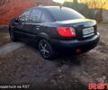 Чорний Кіа Ріо, об'ємом двигуна 1.4 л та пробігом 320 тис. км за 4400 $, фото 1 на Automoto.ua