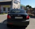 Черный Киа Рио, объемом двигателя 1.4 л и пробегом 235 тыс. км за 3200 $, фото 10 на Automoto.ua