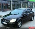 Чорний Кіа Ріо, об'ємом двигуна 1.4 л та пробігом 230 тис. км за 5800 $, фото 2 на Automoto.ua