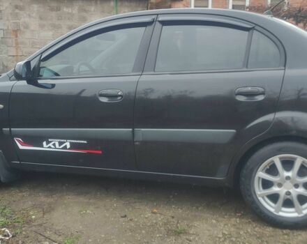 Черный Киа Рио, объемом двигателя 1.4 л и пробегом 229 тыс. км за 4200 $, фото 1 на Automoto.ua