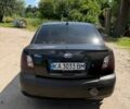 Черный Киа Рио, объемом двигателя 1.4 л и пробегом 135 тыс. км за 5500 $, фото 1 на Automoto.ua