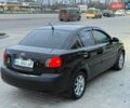 Чорний Кіа Ріо, об'ємом двигуна 1.4 л та пробігом 230 тис. км за 5800 $, фото 5 на Automoto.ua