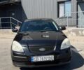 Черный Киа Рио, объемом двигателя 1.4 л и пробегом 235 тыс. км за 3200 $, фото 14 на Automoto.ua