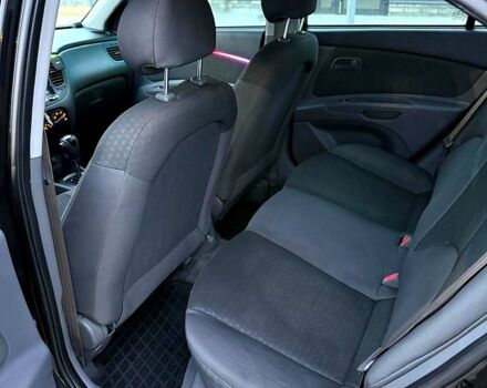 Чорний Кіа Ріо, об'ємом двигуна 1.4 л та пробігом 230 тис. км за 5800 $, фото 8 на Automoto.ua