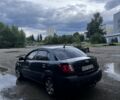 Чорний Кіа Ріо, об'ємом двигуна 1.4 л та пробігом 300 тис. км за 1998 $, фото 4 на Automoto.ua