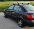 Черный Киа Рио, объемом двигателя 1.4 л и пробегом 328 тыс. км за 3450 $, фото 2 на Automoto.ua