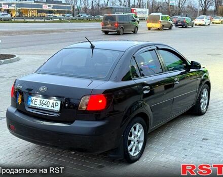 Чорний Кіа Ріо, об'ємом двигуна 1.4 л та пробігом 230 тис. км за 5800 $, фото 4 на Automoto.ua
