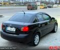 Чорний Кіа Ріо, об'ємом двигуна 1.4 л та пробігом 230 тис. км за 5800 $, фото 4 на Automoto.ua
