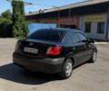 Черный Киа Рио, объемом двигателя 1.4 л и пробегом 235 тыс. км за 3200 $, фото 8 на Automoto.ua