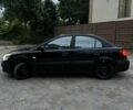 Черный Киа Рио, объемом двигателя 1.4 л и пробегом 200 тыс. км за 4005 $, фото 2 на Automoto.ua