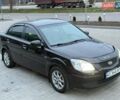 Чорний Кіа Ріо, об'ємом двигуна 1.4 л та пробігом 230 тис. км за 5800 $, фото 1 на Automoto.ua