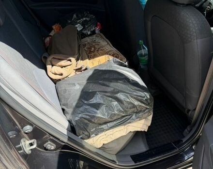 Чорний Кіа Ріо, об'ємом двигуна 1.4 л та пробігом 135 тис. км за 5500 $, фото 11 на Automoto.ua