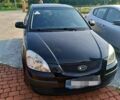 Черный Киа Рио, объемом двигателя 1.4 л и пробегом 196 тыс. км за 4800 $, фото 1 на Automoto.ua