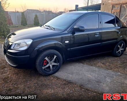 Чорний Кіа Ріо, об'ємом двигуна 1.4 л та пробігом 320 тис. км за 4400 $, фото 5 на Automoto.ua