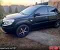 Чорний Кіа Ріо, об'ємом двигуна 1.4 л та пробігом 320 тис. км за 4400 $, фото 5 на Automoto.ua