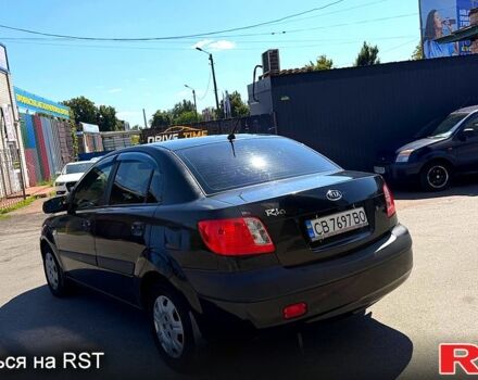 Чорний Кіа Ріо, об'ємом двигуна 1.4 л та пробігом 235 тис. км за 3200 $, фото 7 на Automoto.ua