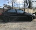 Чорний Кіа Ріо, об'ємом двигуна 1.4 л та пробігом 240 тис. км за 4600 $, фото 4 на Automoto.ua