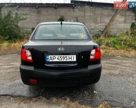 Чорний Кіа Ріо, об'ємом двигуна 1.4 л та пробігом 245 тис. км за 3900 $, фото 4 на Automoto.ua