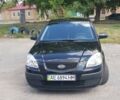 Черный Киа Рио, объемом двигателя 1.4 л и пробегом 104 тыс. км за 7000 $, фото 21 на Automoto.ua