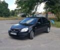 Черный Киа Рио, объемом двигателя 1.4 л и пробегом 104 тыс. км за 7000 $, фото 1 на Automoto.ua