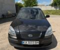 Чорний Кіа Ріо, об'ємом двигуна 1.4 л та пробігом 135 тис. км за 5500 $, фото 7 на Automoto.ua