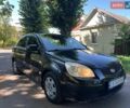 Чорний Кіа Ріо, об'ємом двигуна 1.4 л та пробігом 235 тис. км за 2900 $, фото 2 на Automoto.ua