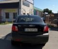 Чорний Кіа Ріо, об'ємом двигуна 1.4 л та пробігом 235 тис. км за 2900 $, фото 9 на Automoto.ua