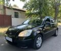 Черный Киа Рио, объемом двигателя 1.4 л и пробегом 235 тыс. км за 3200 $, фото 1 на Automoto.ua