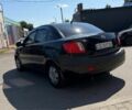 Черный Киа Рио, объемом двигателя 1.4 л и пробегом 235 тыс. км за 3200 $, фото 5 на Automoto.ua