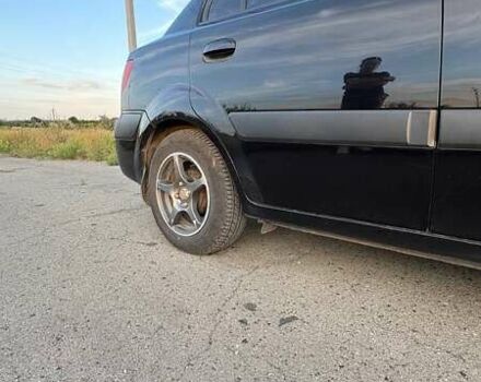 Чорний Кіа Ріо, об'ємом двигуна 1.4 л та пробігом 168 тис. км за 5600 $, фото 10 на Automoto.ua