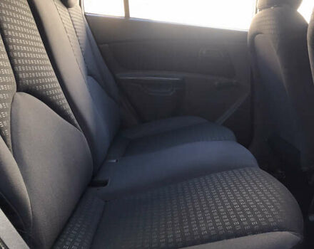 Черный Киа Рио, объемом двигателя 1.4 л и пробегом 291 тыс. км за 5500 $, фото 18 на Automoto.ua