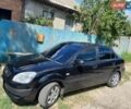 Черный Киа Рио, объемом двигателя 1.4 л и пробегом 214 тыс. км за 4600 $, фото 1 на Automoto.ua