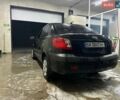 Черный Киа Рио, объемом двигателя 1.4 л и пробегом 216 тыс. км за 3300 $, фото 5 на Automoto.ua