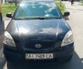 Черный Киа Рио, объемом двигателя 1.4 л и пробегом 146 тыс. км за 4350 $, фото 1 на Automoto.ua