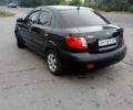 Черный Киа Рио, объемом двигателя 1.4 л и пробегом 85 тыс. км за 6000 $, фото 1 на Automoto.ua