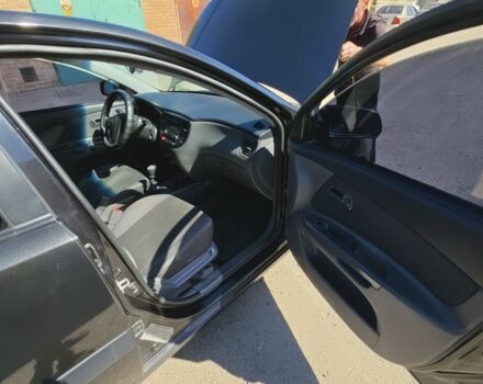 Черный Киа Рио, объемом двигателя 1.5 л и пробегом 239 тыс. км за 4498 $, фото 5 на Automoto.ua