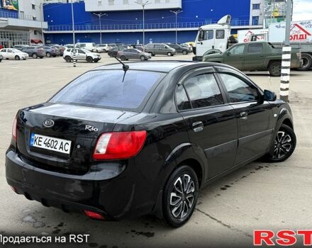Чорний Кіа Ріо, об'ємом двигуна 1.4 л та пробігом 220 тис. км за 4700 $, фото 5 на Automoto.ua