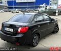 Чорний Кіа Ріо, об'ємом двигуна 1.4 л та пробігом 220 тис. км за 4700 $, фото 5 на Automoto.ua