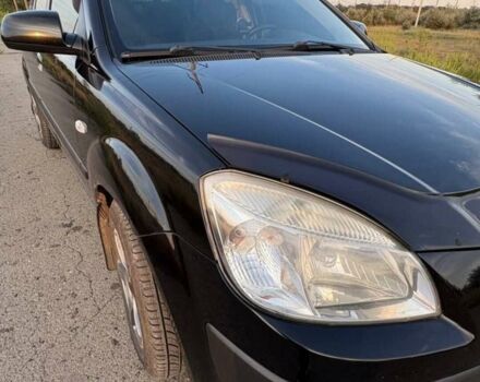 Чорний Кіа Ріо, об'ємом двигуна 1.4 л та пробігом 168 тис. км за 5500 $, фото 11 на Automoto.ua