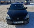 Черный Киа Рио, объемом двигателя 1.4 л и пробегом 259 тыс. км за 4500 $, фото 1 на Automoto.ua