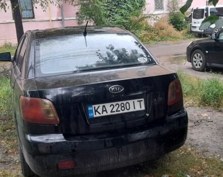 Чорний Кіа Ріо, об'ємом двигуна 1.4 л та пробігом 270 тис. км за 2198 $, фото 2 на Automoto.ua