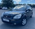Черный Киа Рио, объемом двигателя 1.4 л и пробегом 277 тыс. км за 4600 $, фото 1 на Automoto.ua