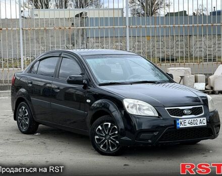 Чорний Кіа Ріо, об'ємом двигуна 1.4 л та пробігом 220 тис. км за 4700 $, фото 2 на Automoto.ua