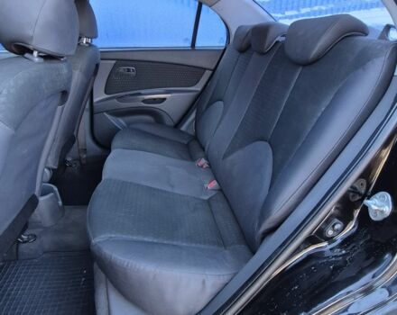 Черный Киа Рио, объемом двигателя 1.4 л и пробегом 220 тыс. км за 4400 $, фото 13 на Automoto.ua