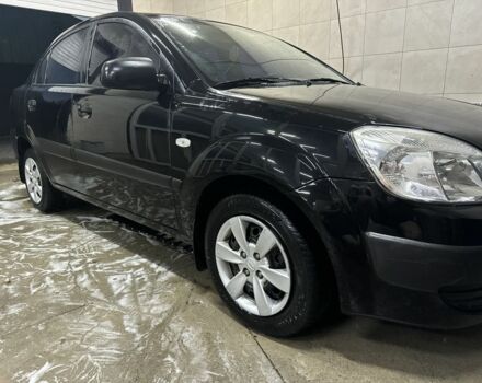 Чорний Кіа Ріо, об'ємом двигуна 1.4 л та пробігом 215 тис. км за 3112 $, фото 2 на Automoto.ua