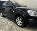Чорний Кіа Ріо, об'ємом двигуна 1.4 л та пробігом 215 тис. км за 3112 $, фото 2 на Automoto.ua