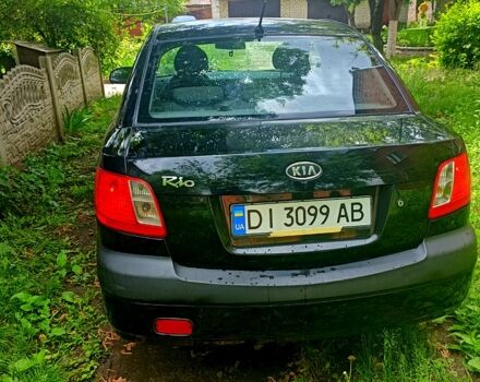 Черный Киа Рио, объемом двигателя 1.4 л и пробегом 260 тыс. км за 3900 $, фото 2 на Automoto.ua
