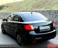 Черный Киа Рио, объемом двигателя 1.4 л и пробегом 224 тыс. км за 4999 $, фото 3 на Automoto.ua