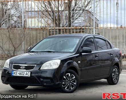 Чорний Кіа Ріо, об'ємом двигуна 1.4 л та пробігом 220 тис. км за 4700 $, фото 4 на Automoto.ua